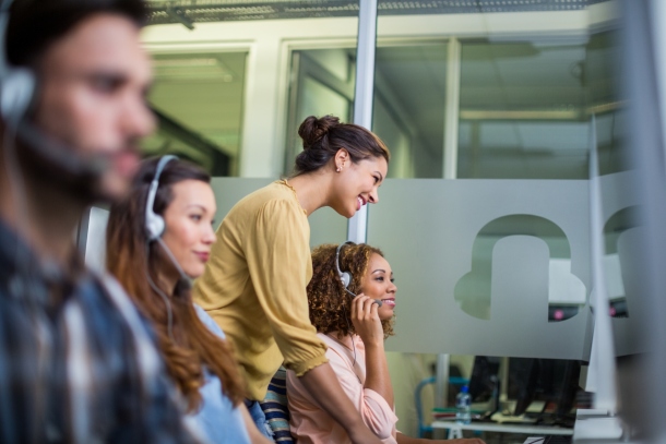 Support agents working on service desk